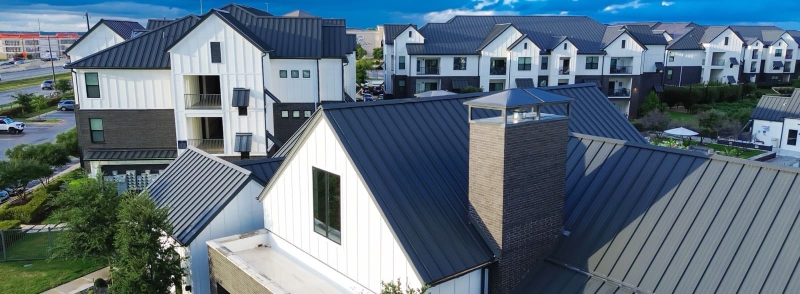 Standing-seam metal roof on a multi-building Florida residential development