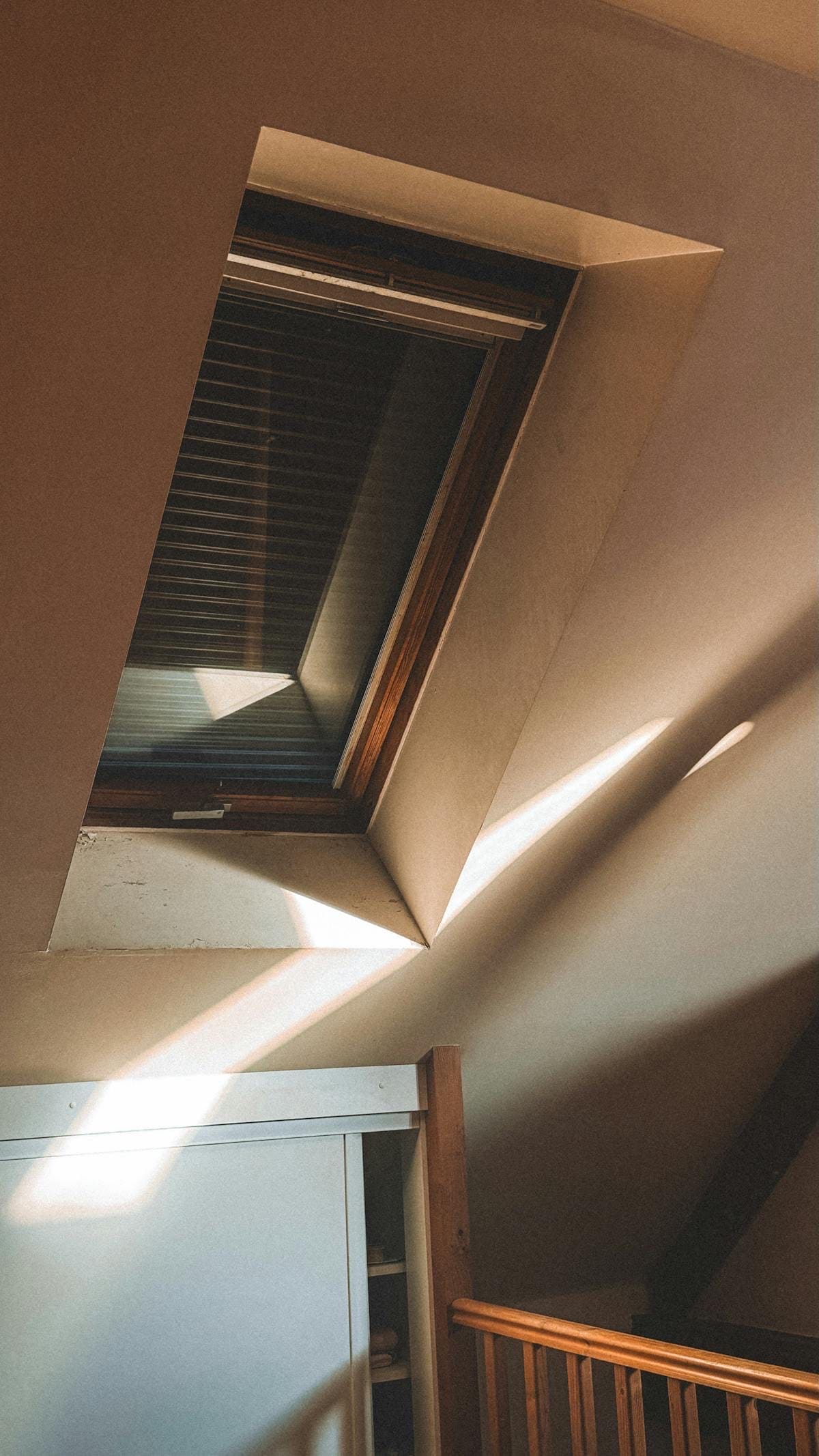 Blown-in attic insulation between rafters
