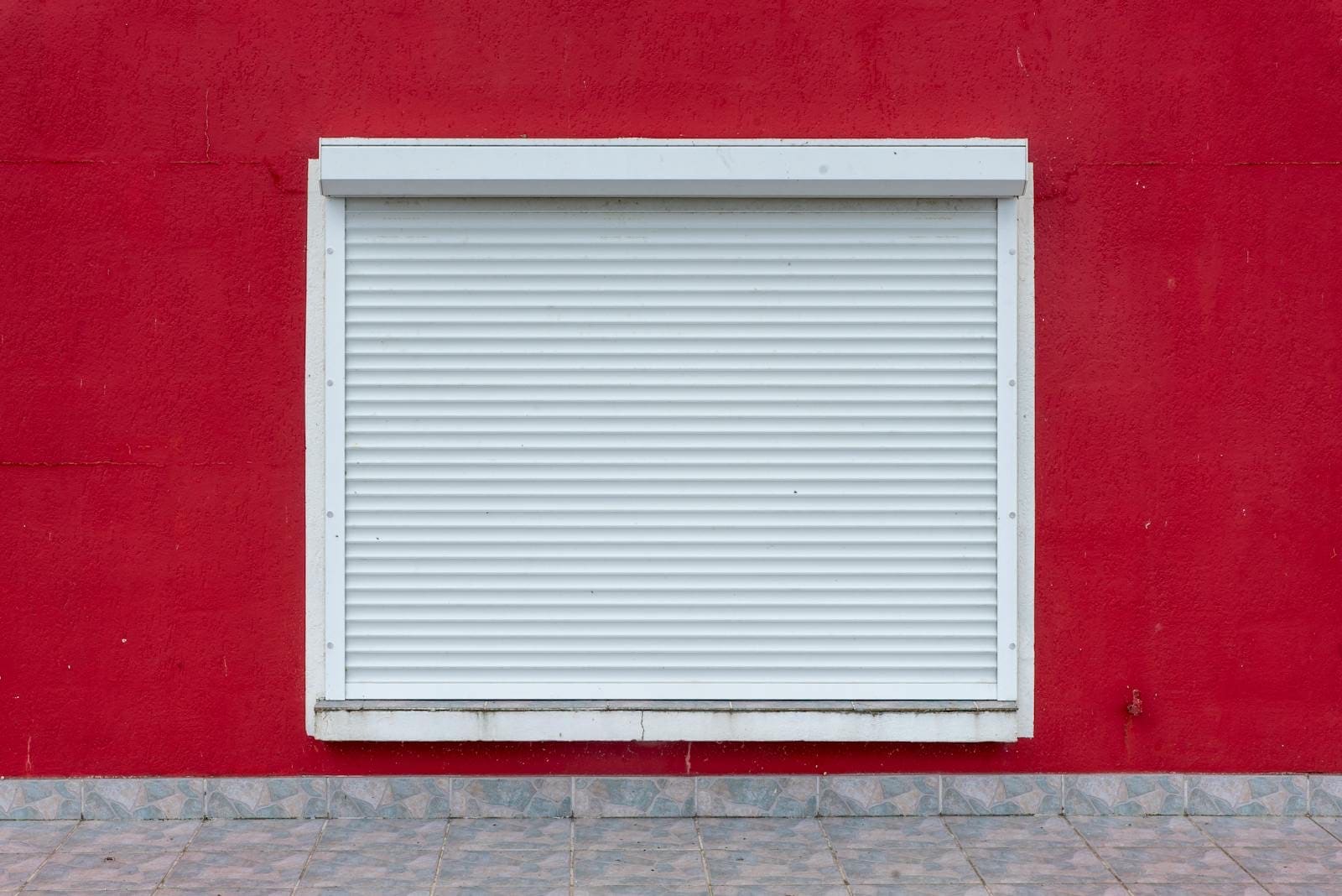 Hurricane storm shutters installed on a Florida home exterior